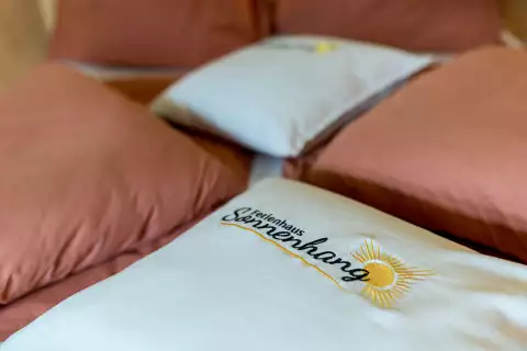 11 Ferienhaus Sonnenhang Apartment Dolomiten Bett